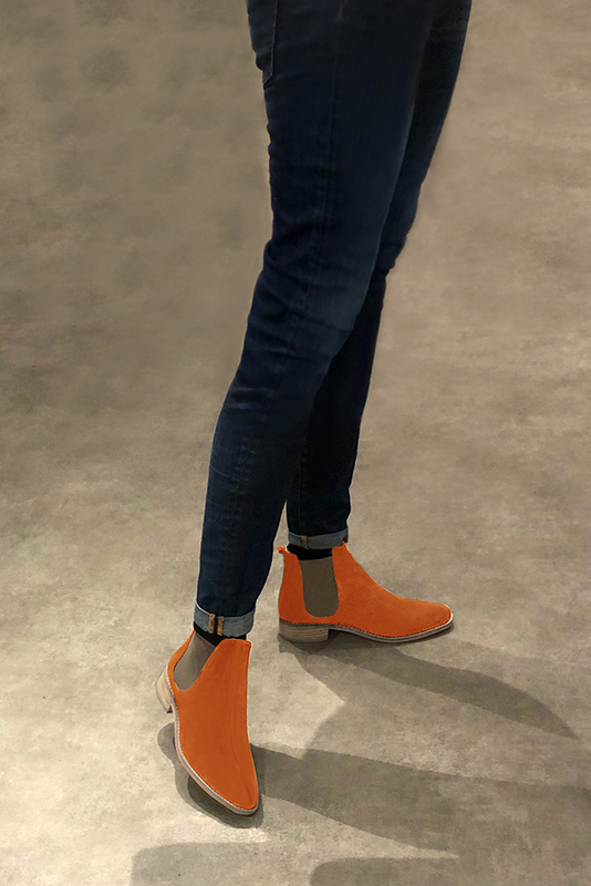 Clementine orange and taupe brown women's ankle boots, with elastics. Round toe. Flat leather soles. Worn view - Florence KOOIJMAN